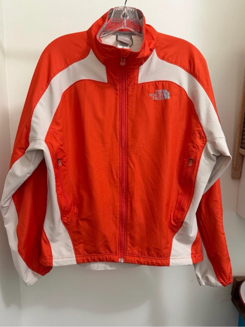 The North Face Women’s Orange and White Utility Jacket
